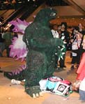 Godzilla playing DDR